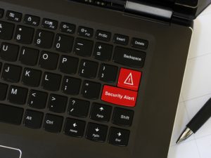 laptop-on-workspace-with-red-keyboard-key-with-the-2021-09-22-18-35-53-utc
