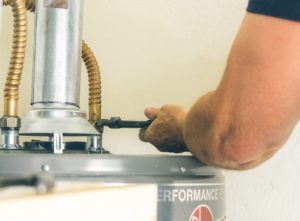 adult-male-arm-with-wrench-in-hand-making-adjustme-2021-08-29-04-35-50-utc