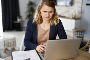 Frustrated woman working during lockdown