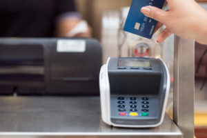 Woman paying with card