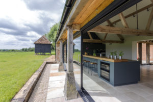 Oxford,UK,Open-air kitchen and backyard in modern home