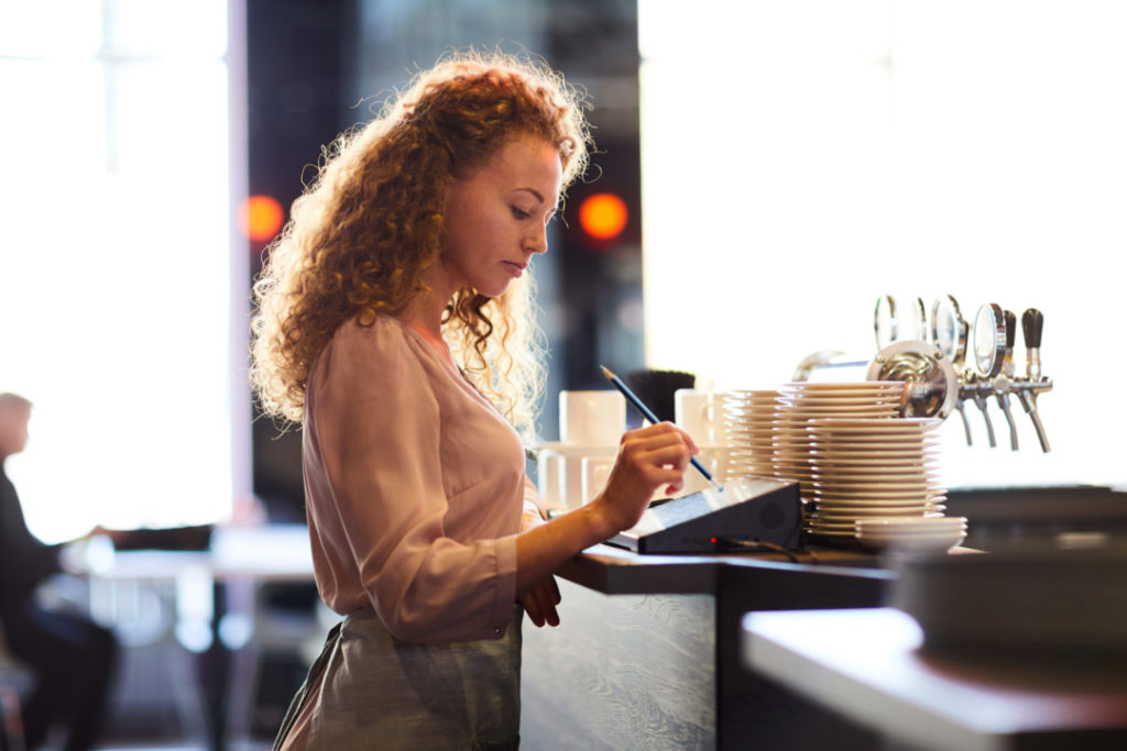 small business owner using a pos