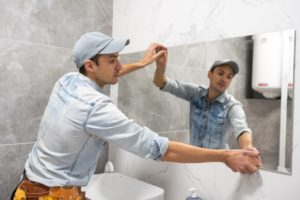 Will Movers Hang TVs, Mirrors, and Pictures on Walls?