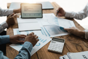Business data dashboard analysis by ingenious computer software . Investment application display business sales and profit on the computer screen and advise marketing planning decision