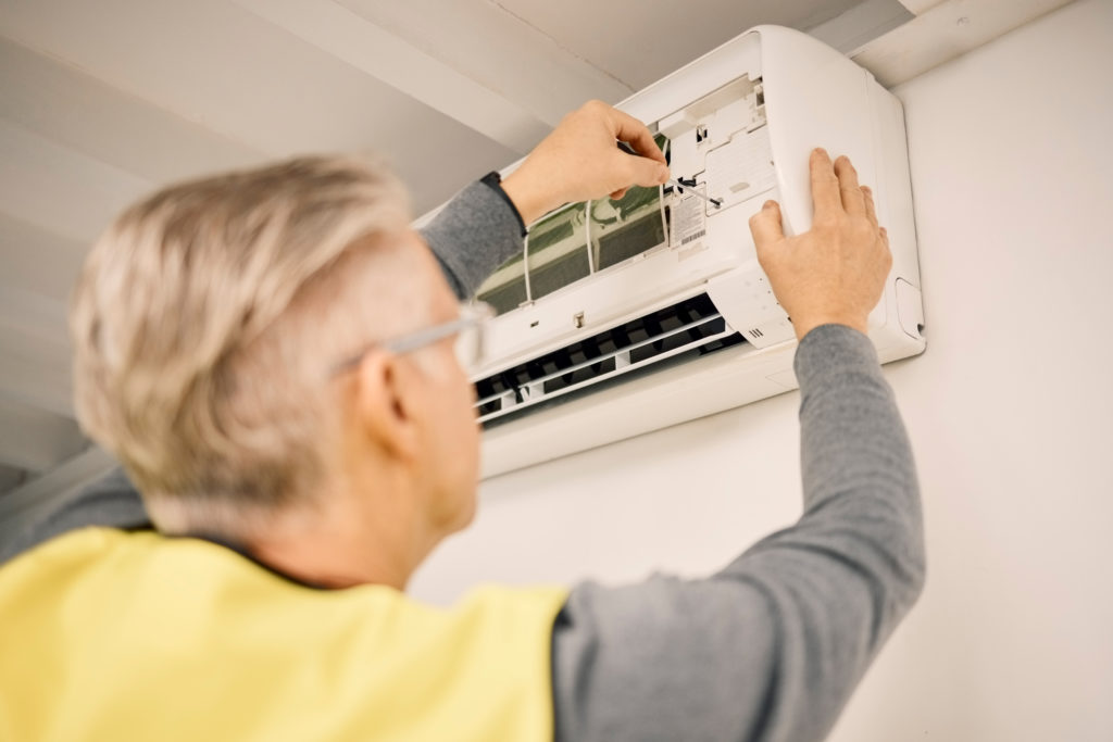 maintenance-installation-and-back-of-a-man-with-a-2023-02-24-23-58-15-utc