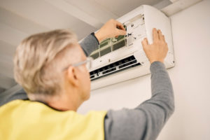 maintenance-installation-and-back-of-a-man-with-a-2023-02-24-23-58-15-utc