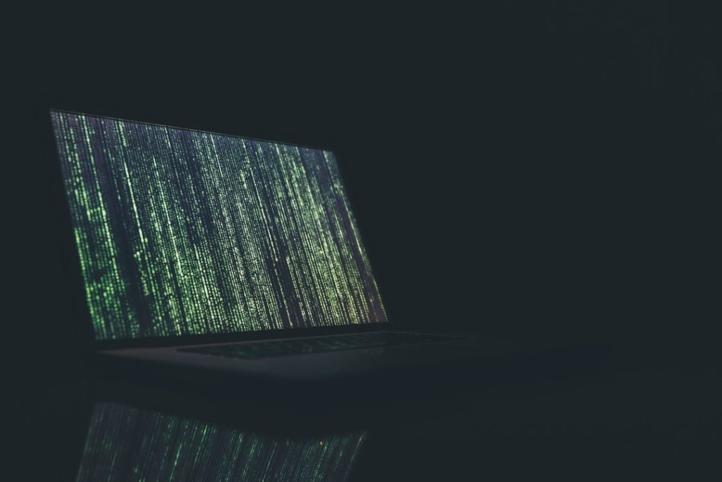 Dark room with computer screen