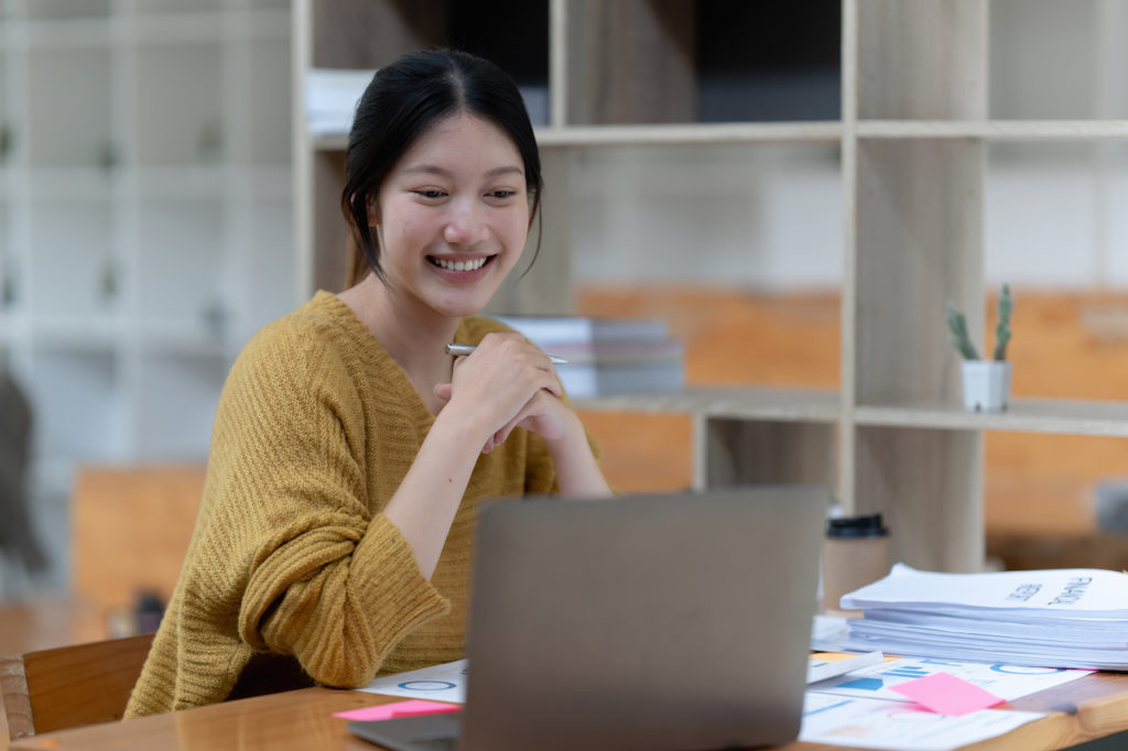 Smart asian business woman smiling at office space. real estate, lawyer, non-profit, marketing, account
