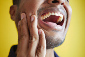 Dealing with Tooth Sensitivity: Causes and Solutions
